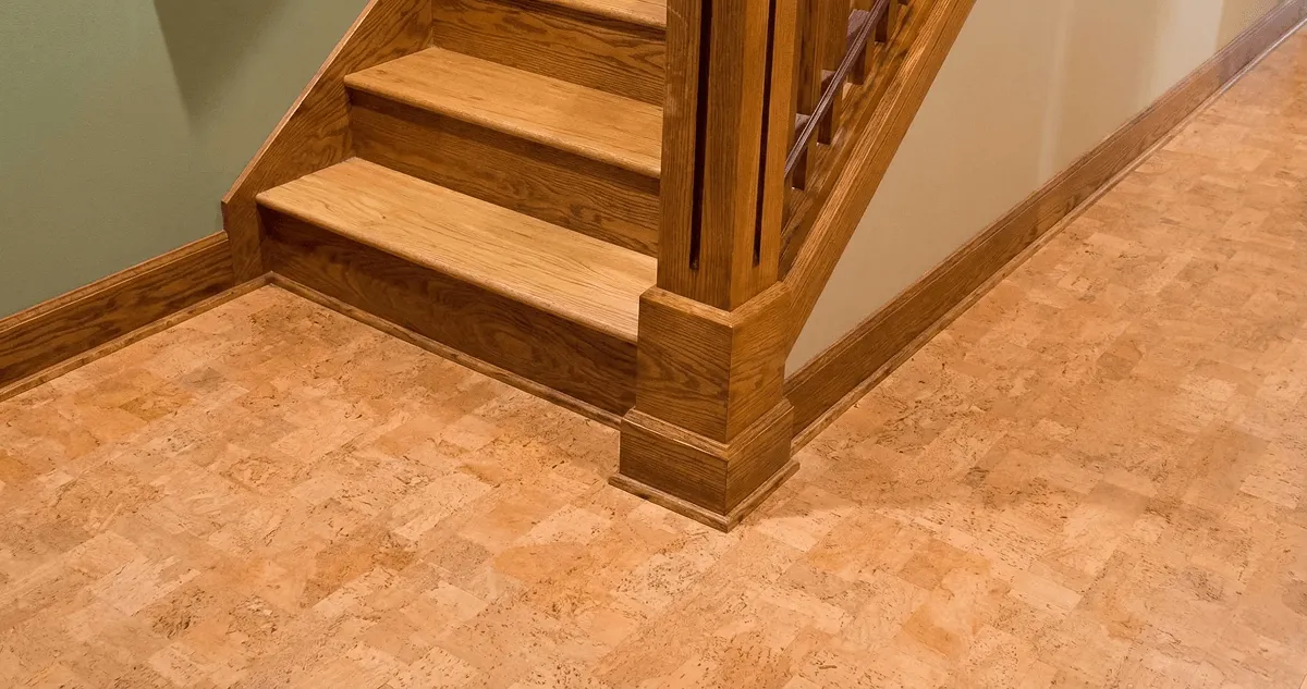 End of a staircase with cork flooring in Orlando, FL