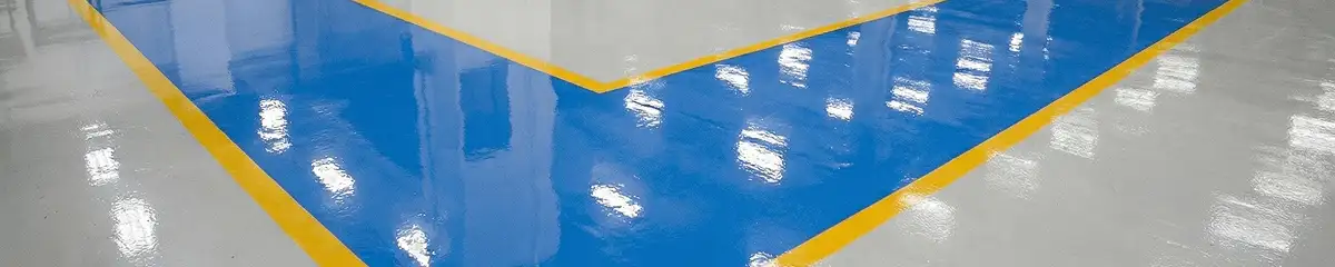 A factory floor professionally covered and marked with epoxy flooring in Orlando, FL