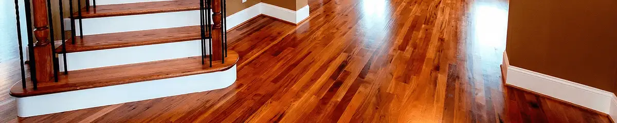 Base floor of a staircase with professionally restored wood flooring in Orlando FL