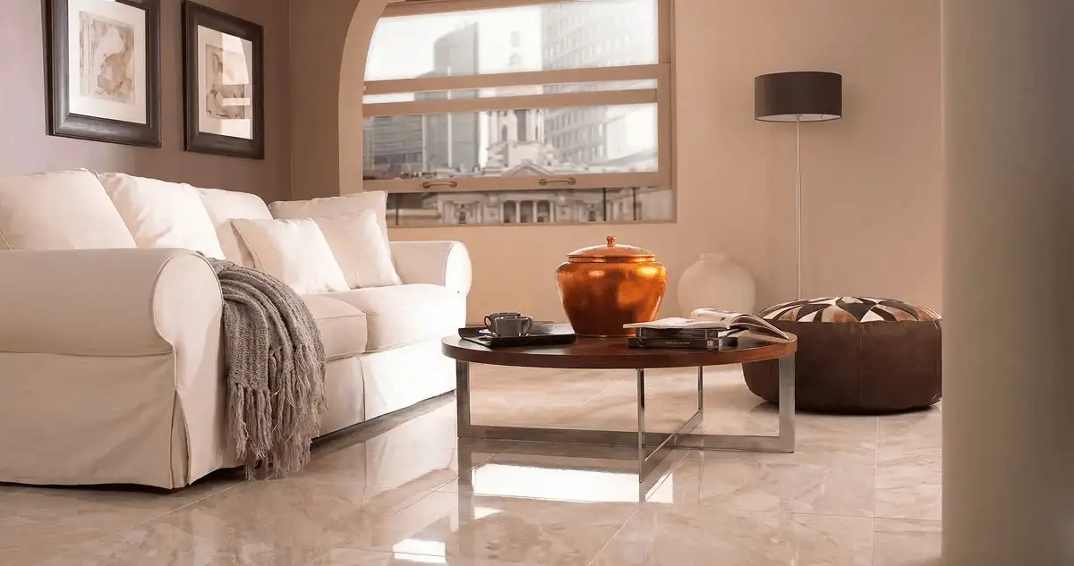 Modern living room with professionally installed marble flooring, a beige sofa, coffee table in Orlando, FL