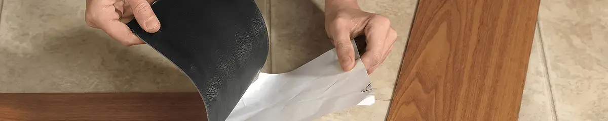 A professional installing vinyl flooring in Orlando, FL